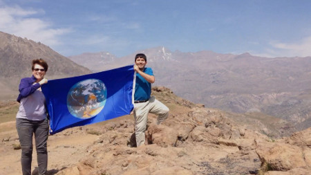 Armando Azua-Bustos and Jen Blank in Chile with the Blue Marble flag